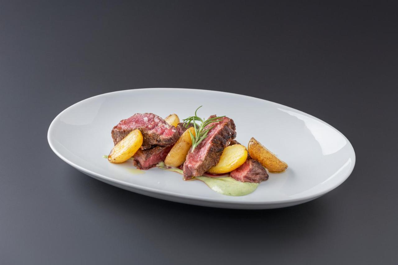 Eurostars Portico Alicante Ngoại thất bức ảnh A steak with potatoes